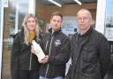 Gareth and Ifan and Ifan’s partner Elin at one of the milk vending sites. Picture: Debbie James