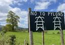 'No To Pylons' banners and signs adorn Powys roadsides, including this one outside Cilmeri.