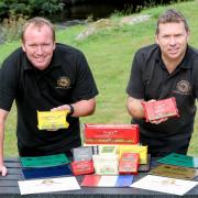 South Caernarfon Creameries new product developer Trystan Povey and head cheese grader Shon Jones with a selection of their award-winning cheeses and butters. Picture: SCC