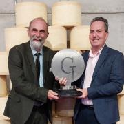 Jack Eade, First Milk customer quality manager, receives the Supreme Champion trophy at the 2022 Global Cheese Awards. Picture: First Milk