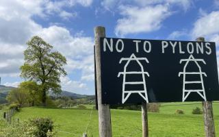 'No To Pylons' banners and signs adorn Powys roadsides, including this one outside Cilmeri.