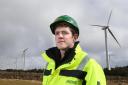 Jones Bros employee Rhys Roberts on site at renewables scheme Brenig Wind Farm.
