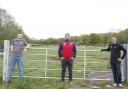 Wyn Jones (centre) on the farm with Joe Yeomans (left) and Meirion Davies both of Dyfed Telecom