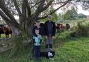Andrea, her husband and her six-year-old son on-farm