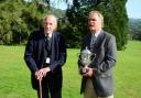 Forestry ‘change maker’ Paul Raymond-Barker BEM, left, receives the Sylva Trophy 2021  from RFS South Wales Division chair Chris Jones