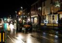 The streets were lit up for the tractor run.