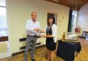 Jonathan Wilkinson, Montgomeryshire NFU Cymru county chairman presents the cheque to Beth Watkins, Montgomery YFC county chairman. (8902933)