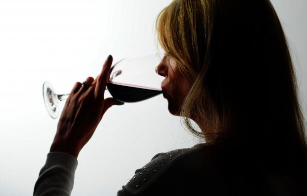 Wales Farmer: A woman drinking red wine. Credit: PA