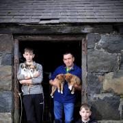 Ifan Evans with his sons, Huw and Gwilym Picture: PRW Photography