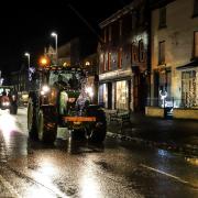 The streets were lit up for the tractor run.