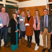 Pictured are the recipients with their cheques. Picture: Deryn Evans.