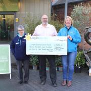 Coed-y-Dinas presenting the cheque to Lingen Davies Cancer Trust.