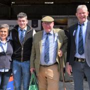 Hosts Sioned Dafydd and Hugh Owen with Glandon Lewis (cap) who opened the event.