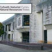 Natural Resources Wales have been awarded £4,500 in costs after two people set up an unlicensed hydroelectric generation scheme.