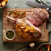 Roast lamb with clementine slices. Image: Phil Boorman