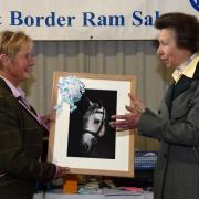 Special moment for Jane Smith as Princess Anne presents her with a framed photograph of her favourite horse, Zeb. Image: NSA