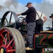 The magnificent Freystrop steam roller, owned by Jeff James of Freystrop, accompanied by his grand daughter, Lottie Mai.